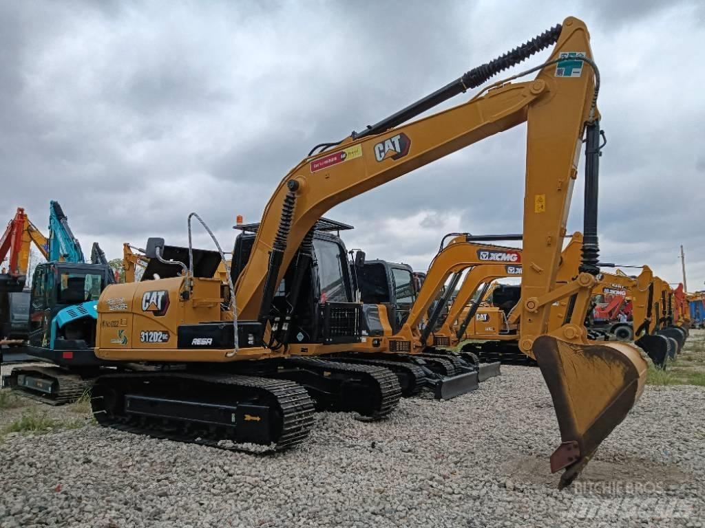CAT 312D2GC Середні екскаватори 7т. - 12т.