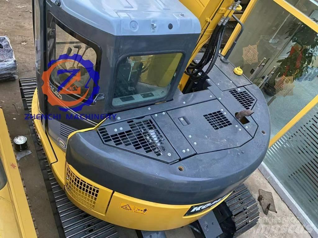 Komatsu PC 128 US Гусеничні екскаватори