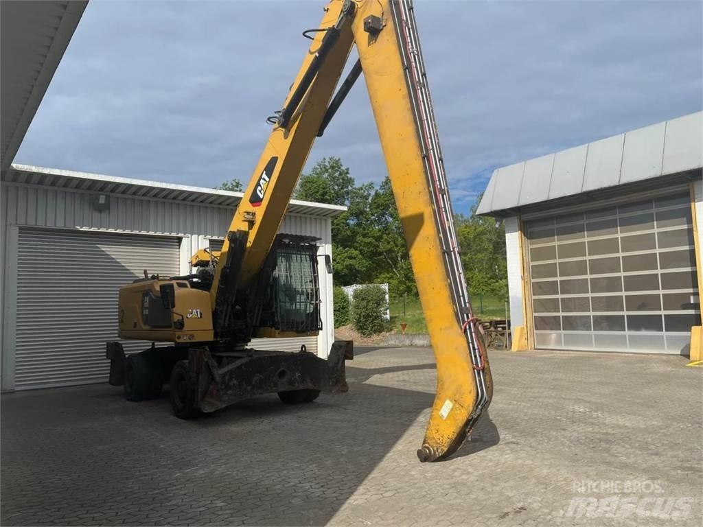 CAT MH3026 Колісні екскаватори