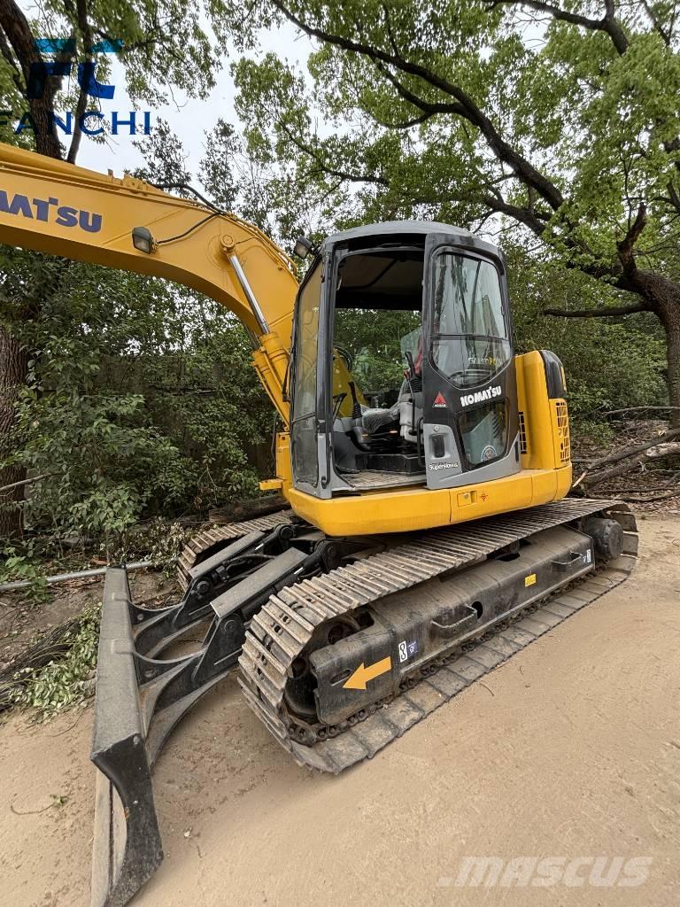 Komatsu PC 128 US Гусеничні екскаватори