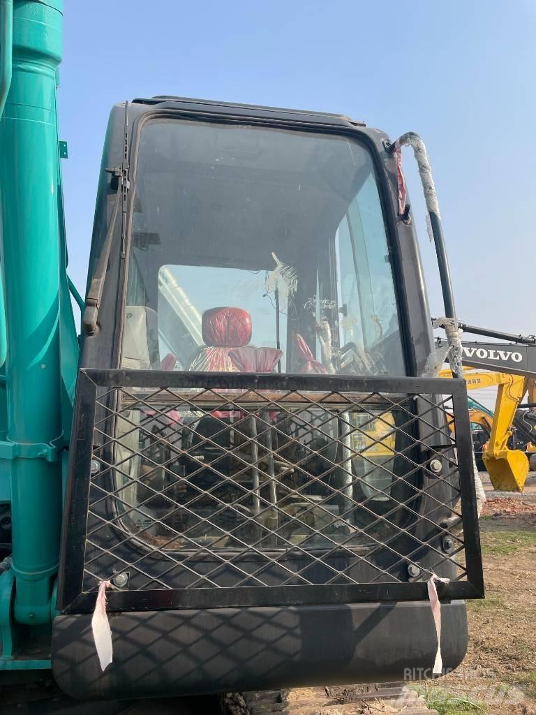 Kobelco SK 200 Гусеничні екскаватори