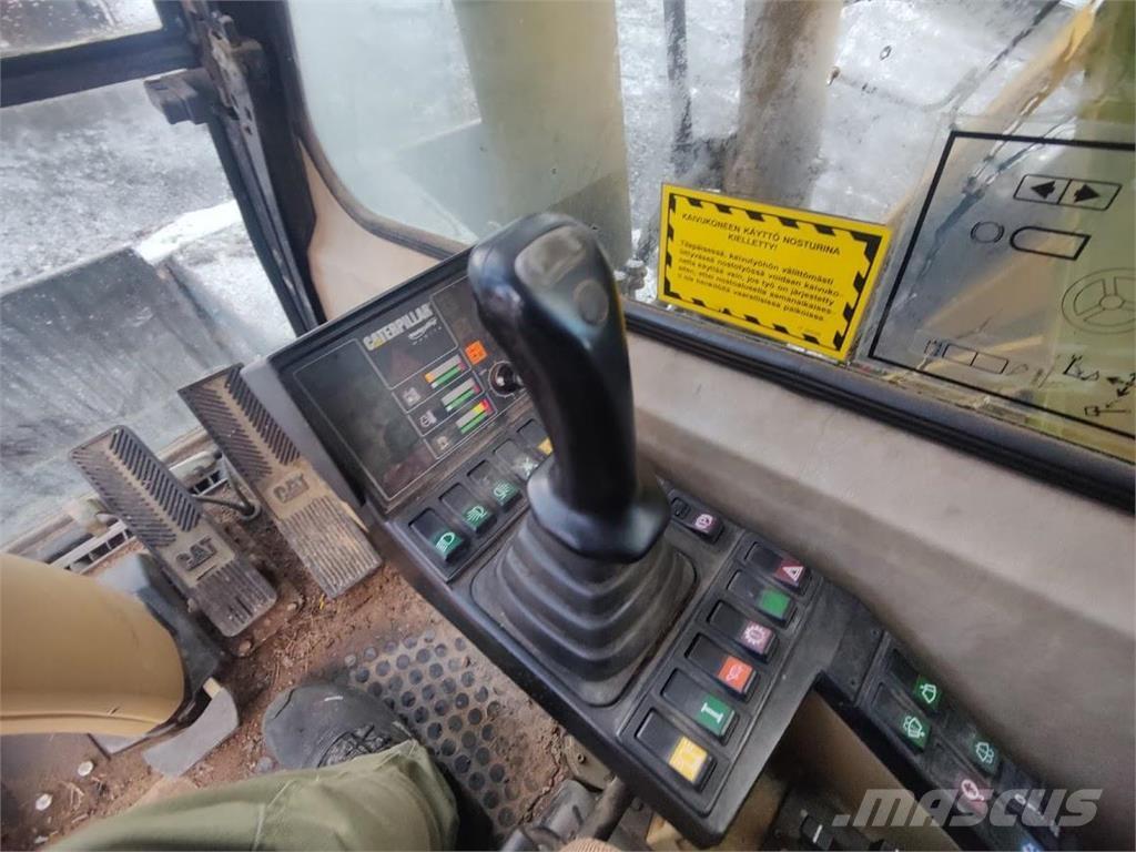 CAT M315 Колісні екскаватори