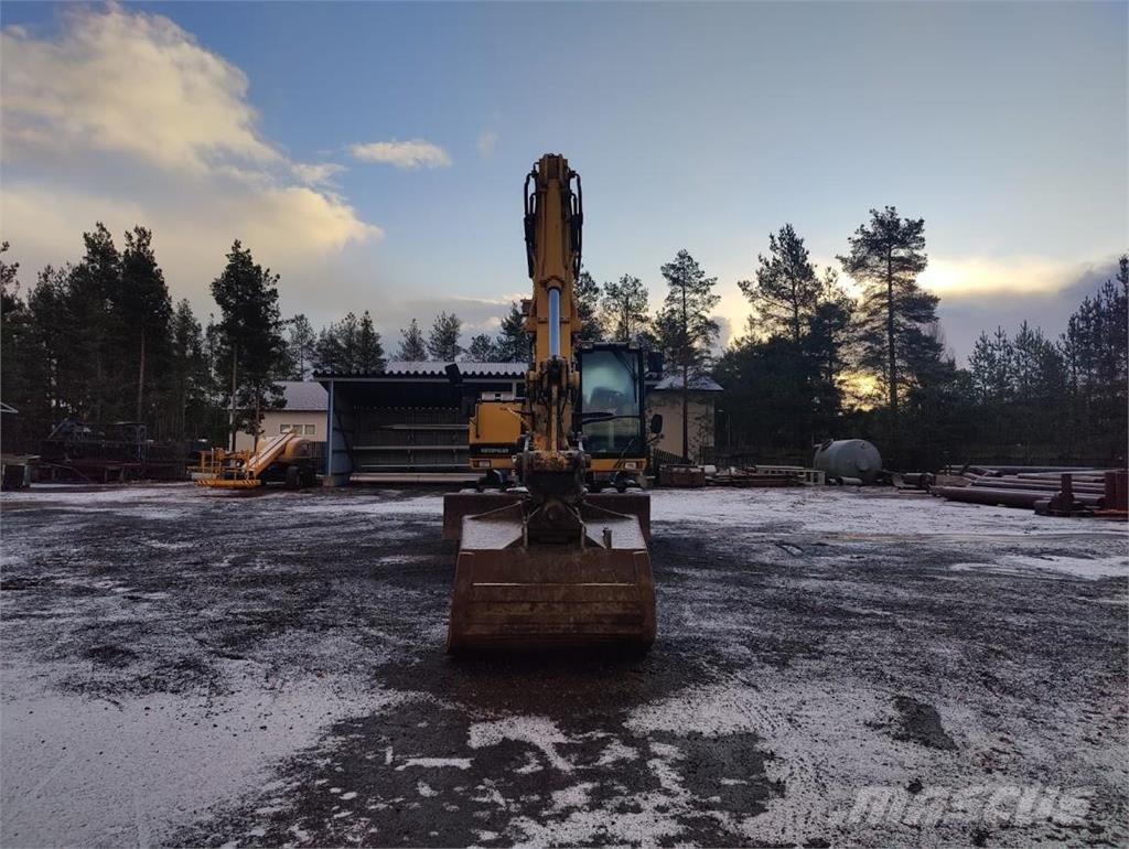 CAT M315 Колісні екскаватори