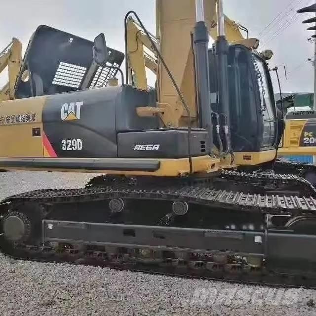 CAT 329 Гусеничні екскаватори