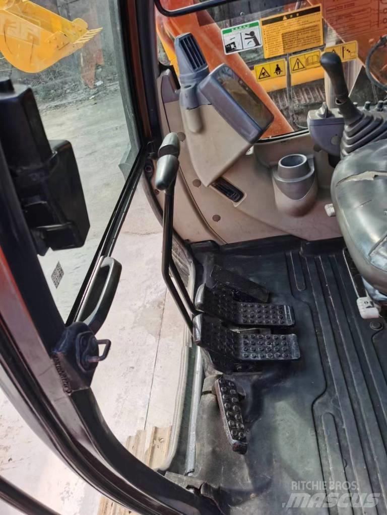 Hitachi ZX 70 Гусеничні екскаватори