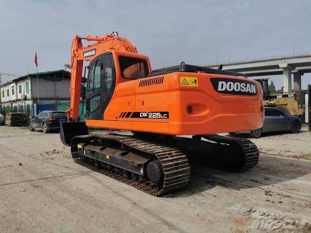 Doosan DX 225 LC Міні-екскаватори < 7т