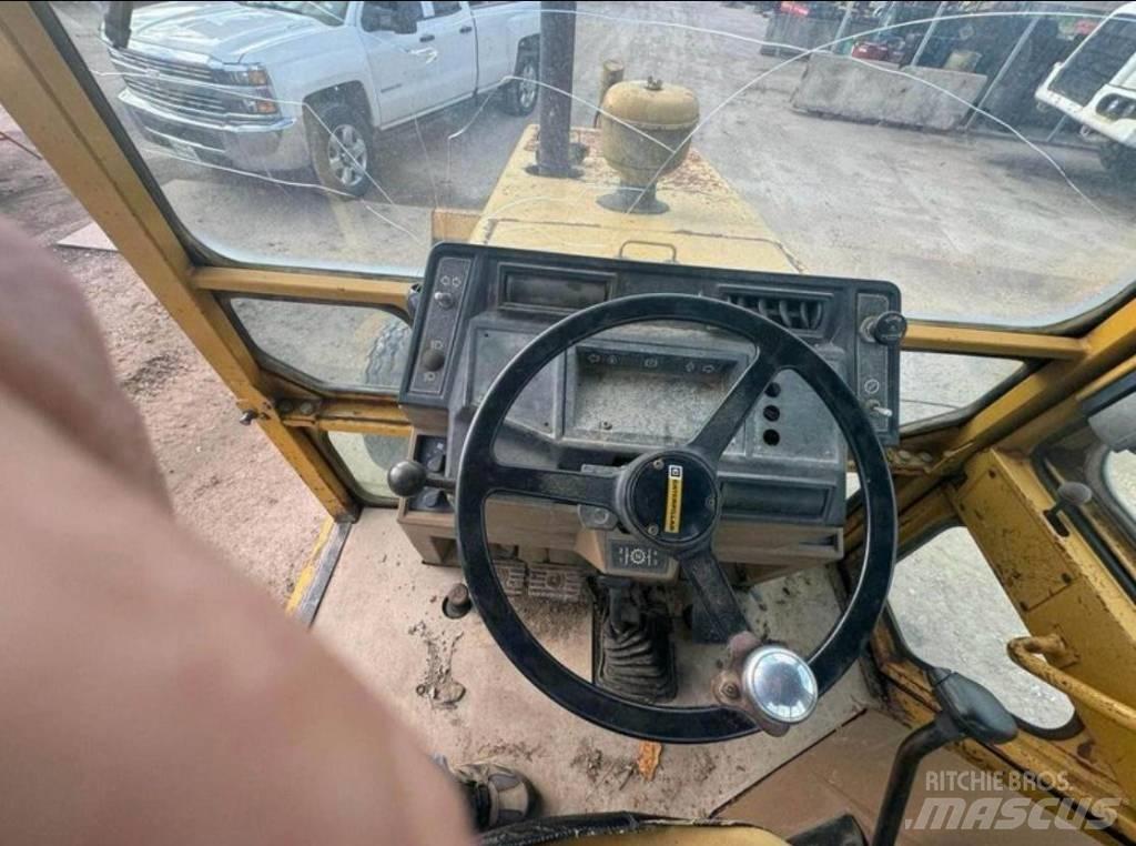 CAT 416 Екскаватори-навантажувачі