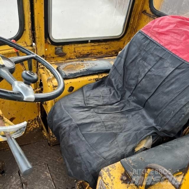 CAT 910 Фронтальні навантажувачі