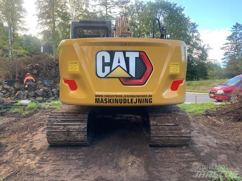 CAT 313 Гусеничні екскаватори