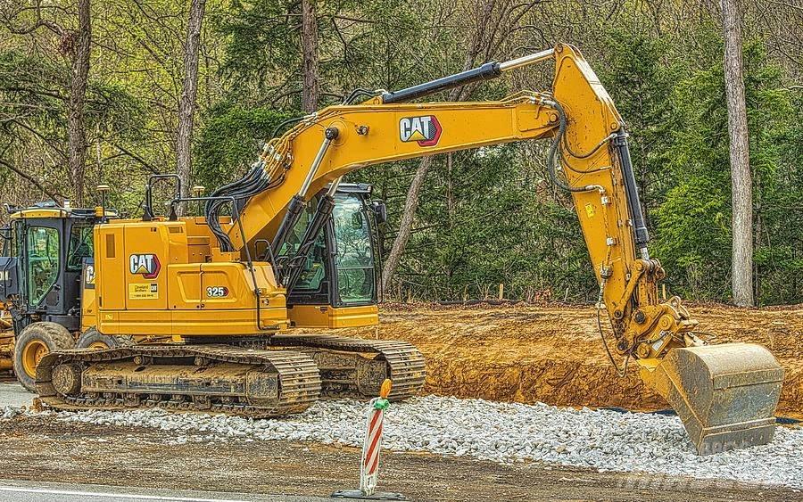 CAT CAT325 Середні екскаватори 7т. - 12т.
