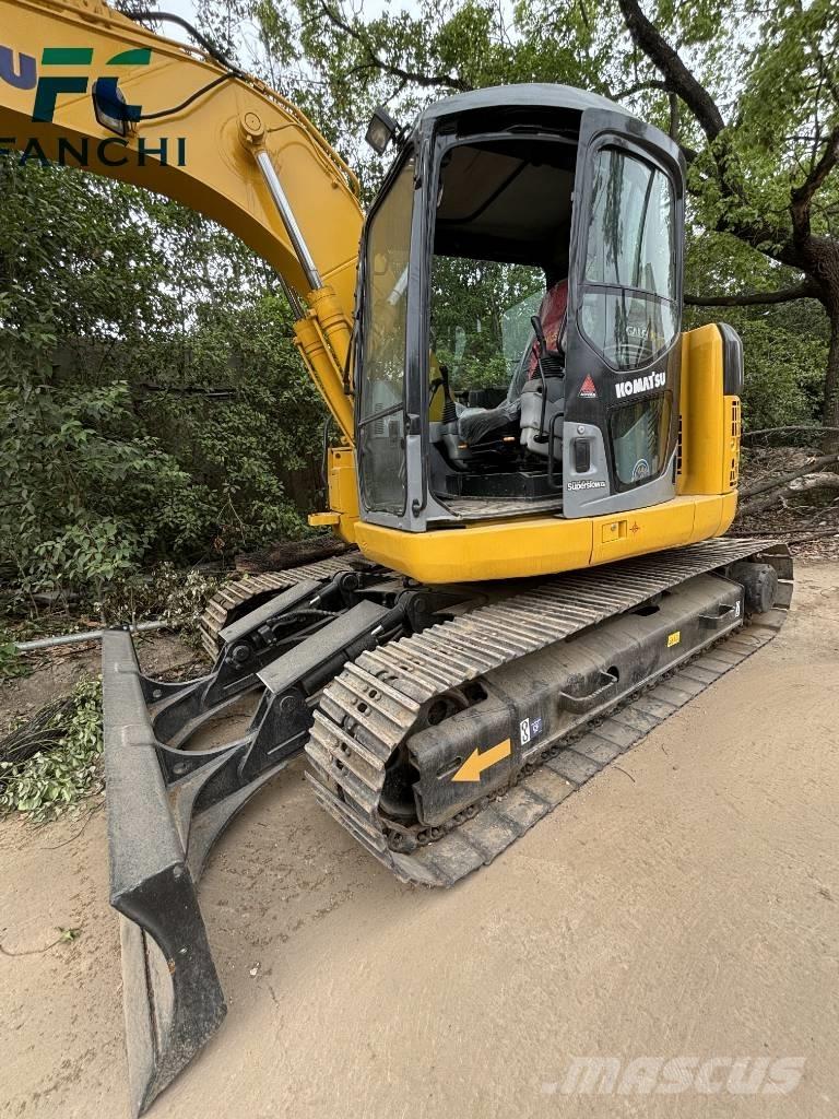 Komatsu PC128US Гусеничні екскаватори