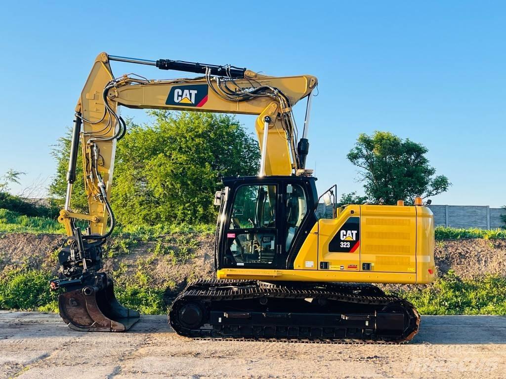 CAT 323 Гусеничні екскаватори