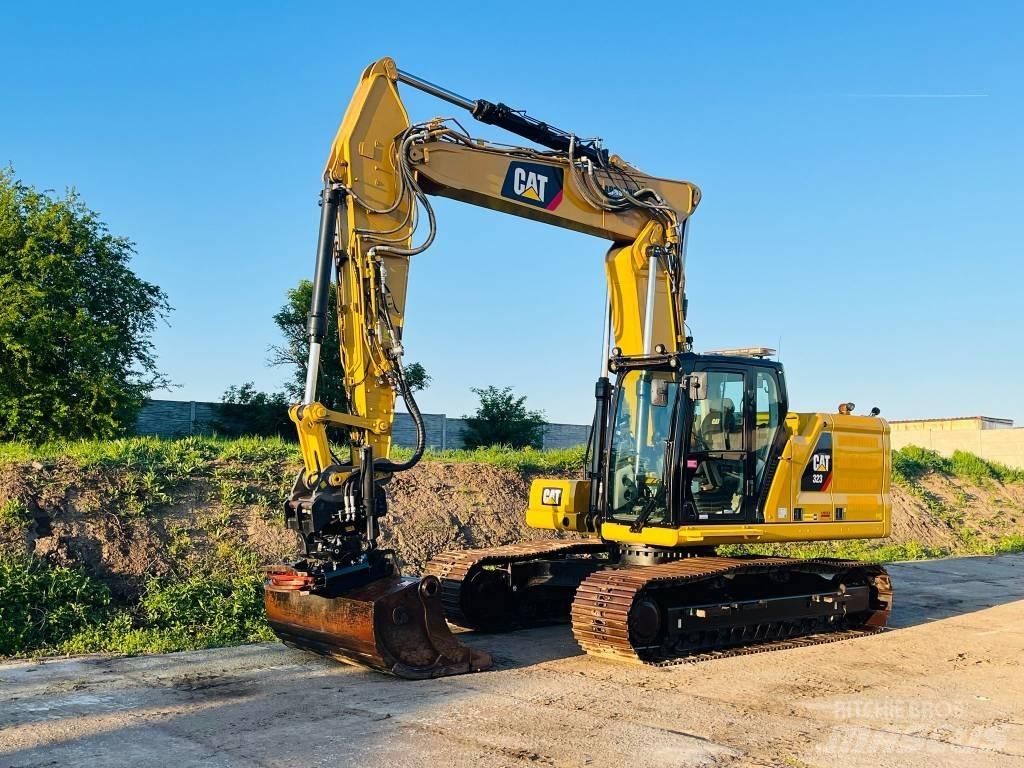 CAT 323 Гусеничні екскаватори