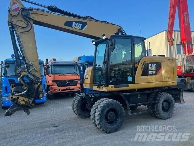 CAT M 318 F Колісні екскаватори