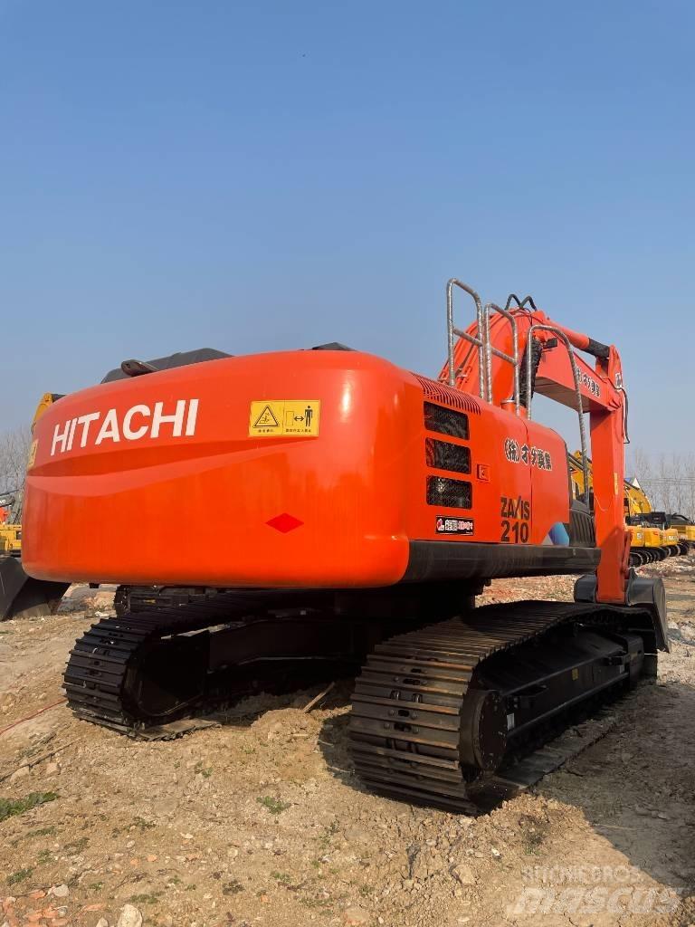 Hitachi 210LC Гусеничні екскаватори