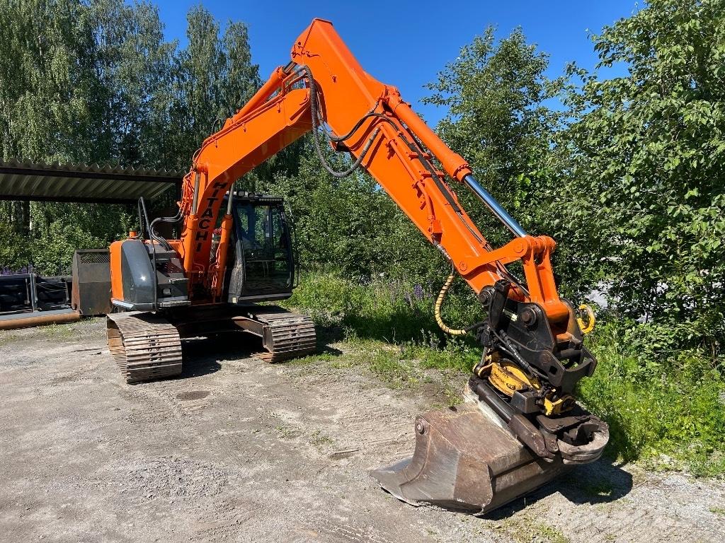 Hitachi ZX 135 US Гусеничні екскаватори