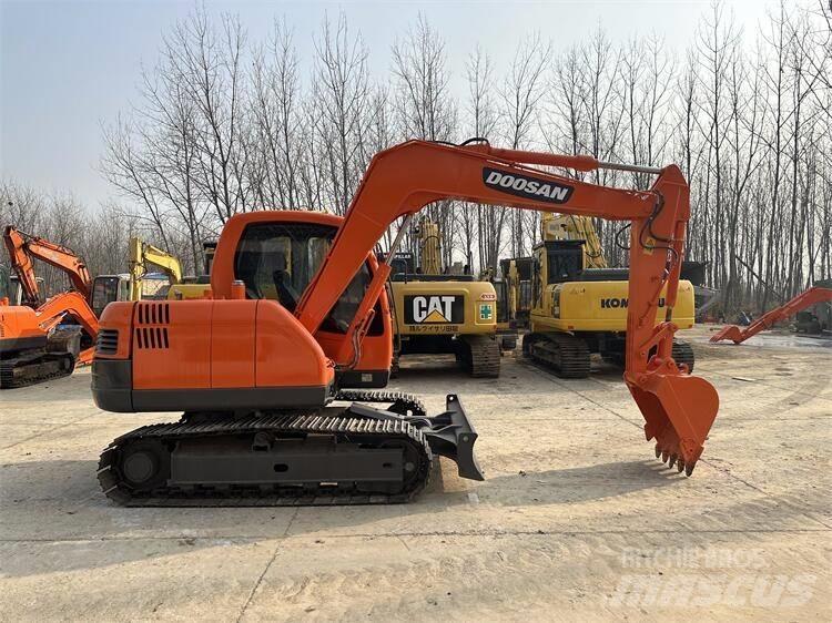 Doosan DX75 Міні-екскаватори < 7т