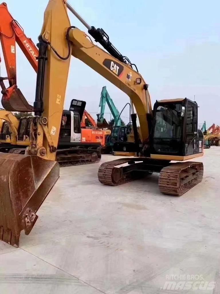 CAT 312 D Гусеничні екскаватори