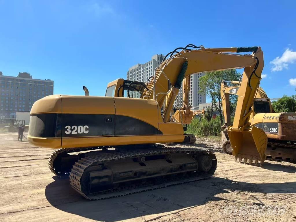 CAT 320 C Гусеничні екскаватори