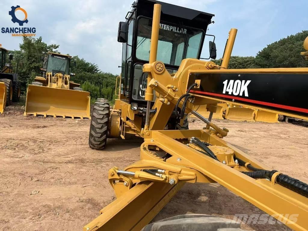 CAT 140K Грейдери
