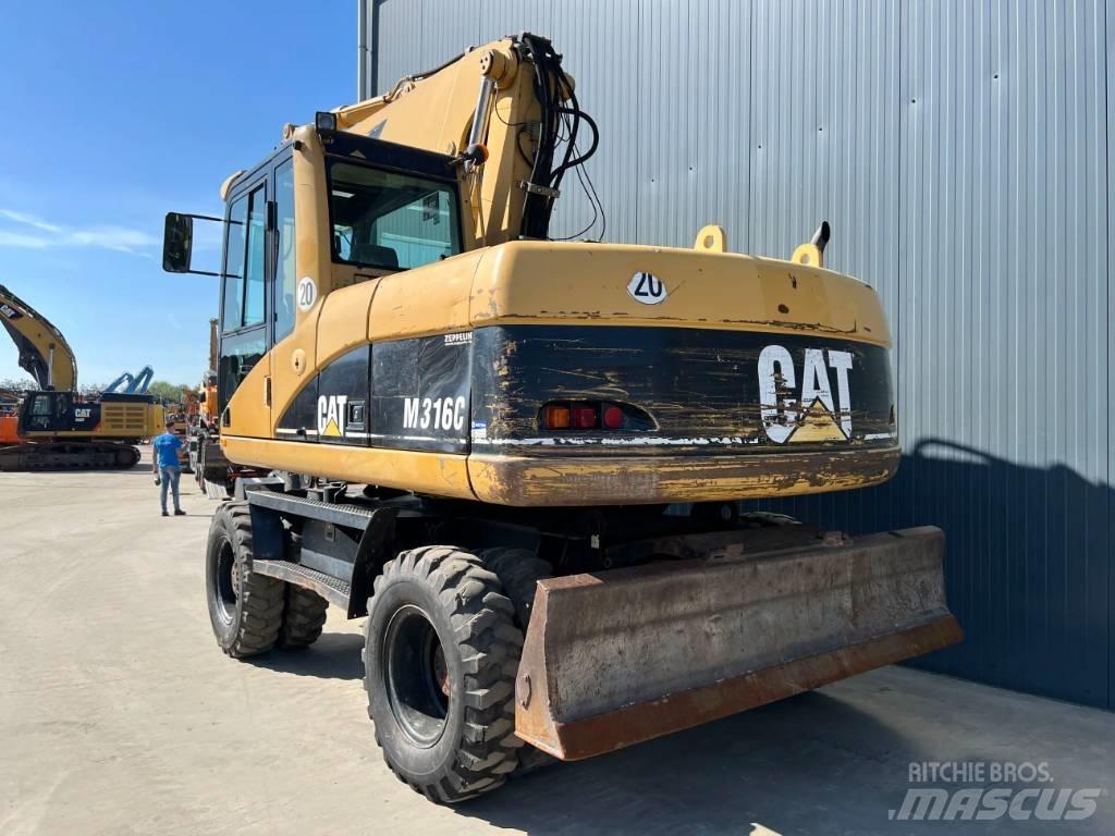 CAT M316C Колісні екскаватори