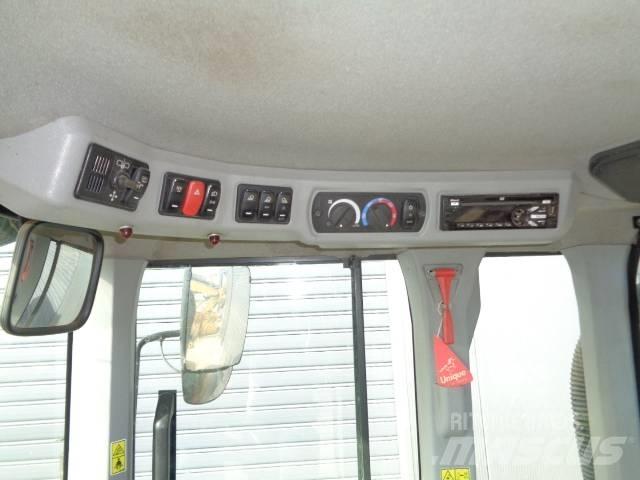 CAT 938M Фронтальні навантажувачі