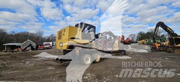 CAT 559C Лісонавантажувачі