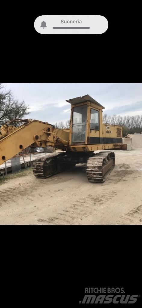 CAT 235 Гусеничні екскаватори