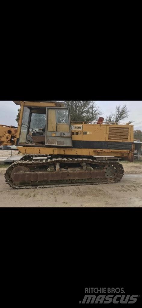 CAT 235 Гусеничні екскаватори