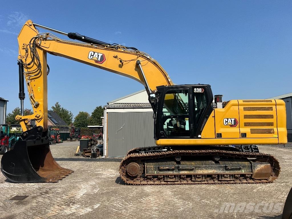 CAT 330 Гусеничні екскаватори
