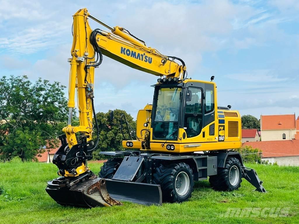 Komatsu PW 160 - 10 Колісні екскаватори