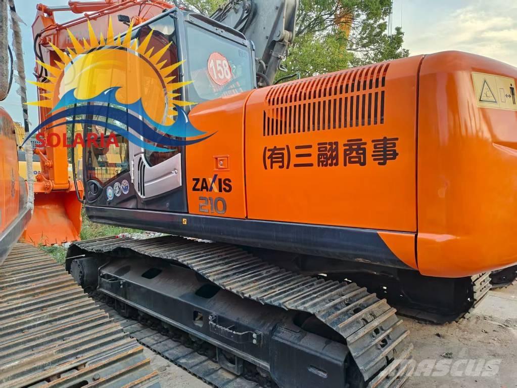 Hitachi ZX 210 Гусеничні екскаватори