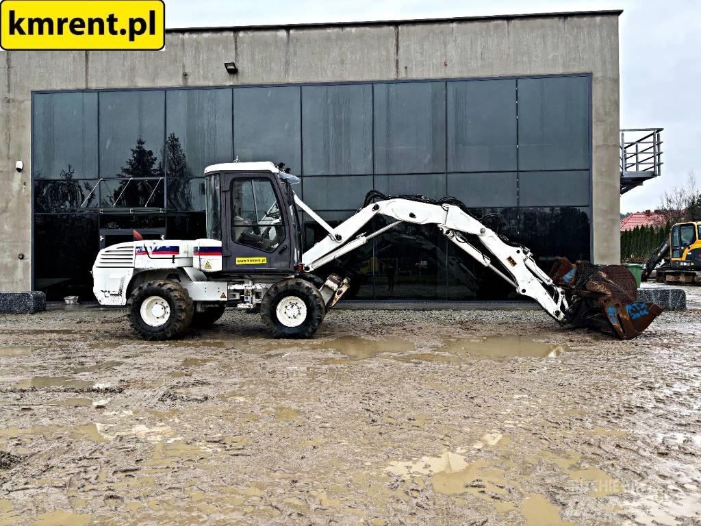 Mecalac 12 M TX Екскаватори-навантажувачі