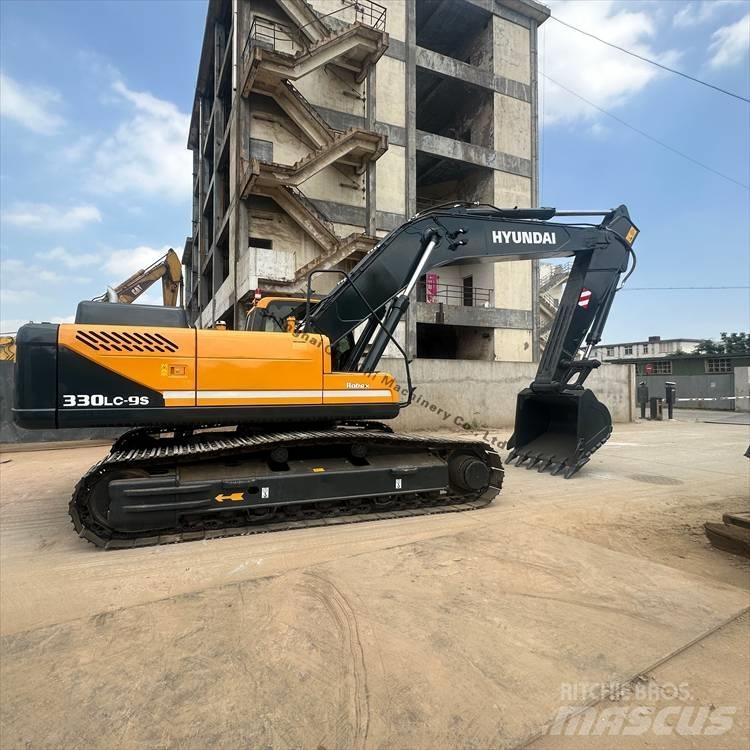 Hyundai 330 Гусеничні екскаватори