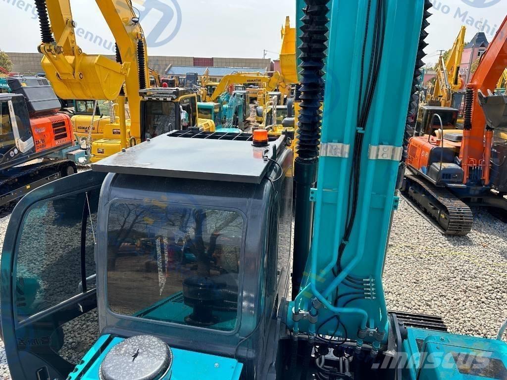 Kobelco SK 200 Гусеничні екскаватори