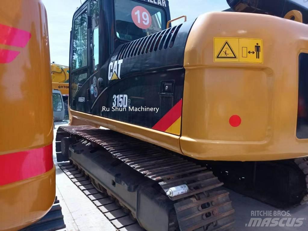 CAT 315 Гусеничні екскаватори