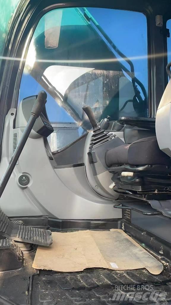 Kobelco SK 200 Гусеничні екскаватори