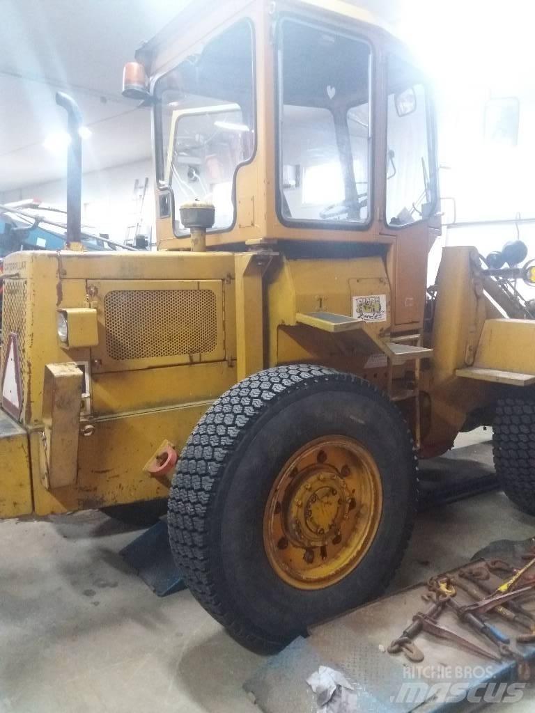 CAT 910 Фронтальні навантажувачі