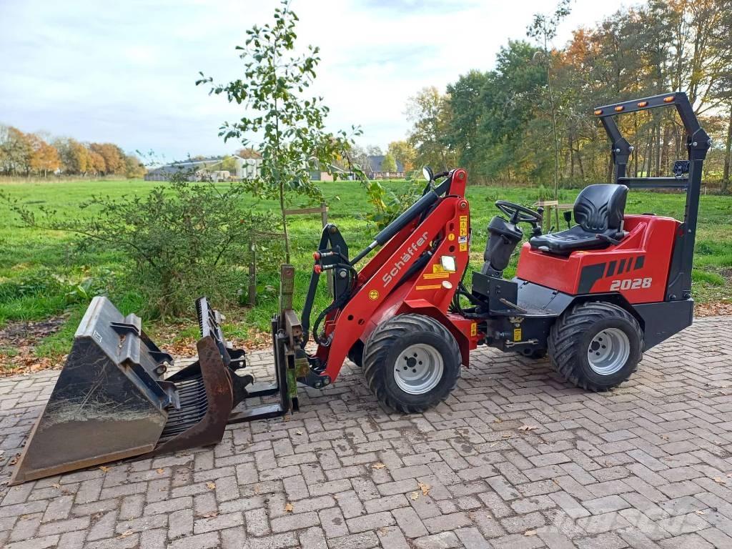 Schäffer 2028 Багатофункціональне обладнання для вантажних і землекопальних робіт