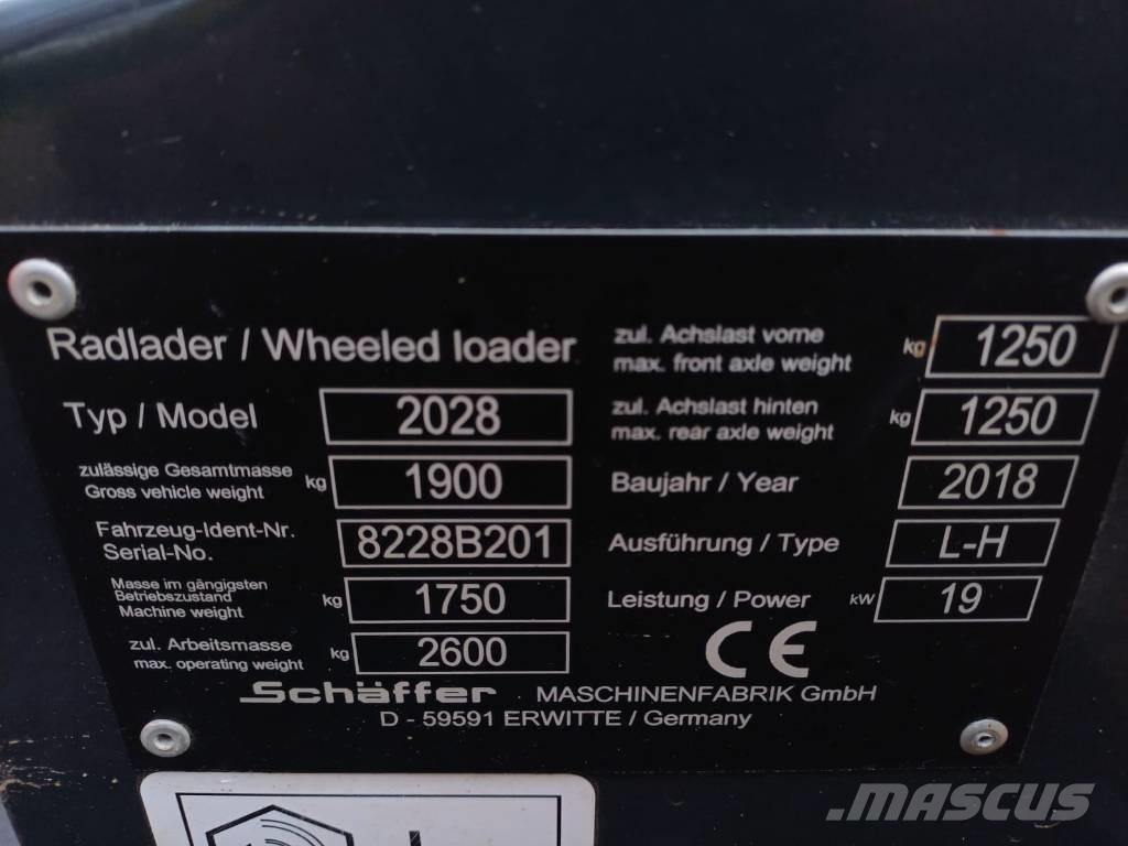 Schäffer 2028 Багатофункціональне обладнання для вантажних і землекопальних робіт