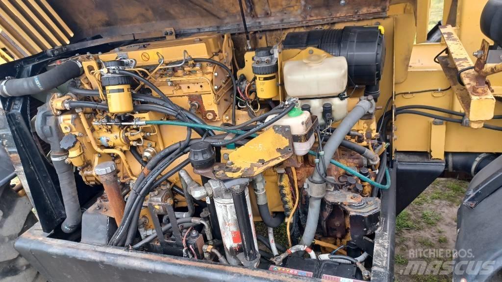 CAT TH 63 Телескопічні навантажувачі