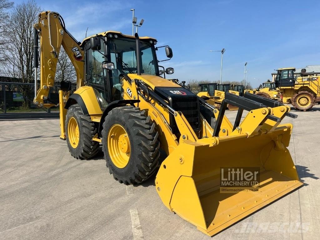 CAT 444 Екскаватори-навантажувачі