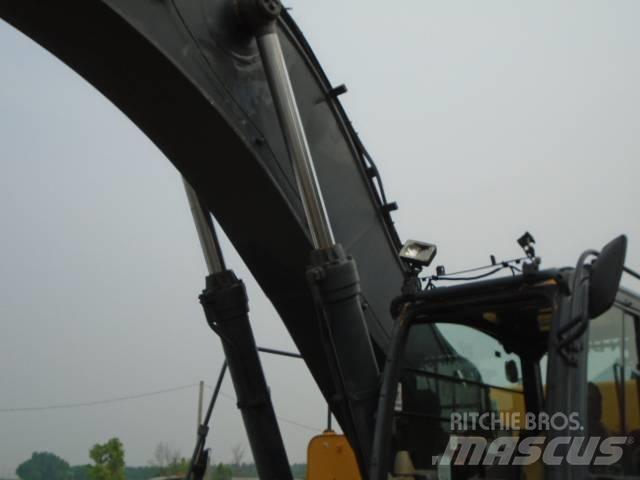 John Deere 450 DLC Гусеничні екскаватори