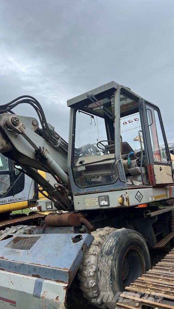 O&K MH Plus Гусениці