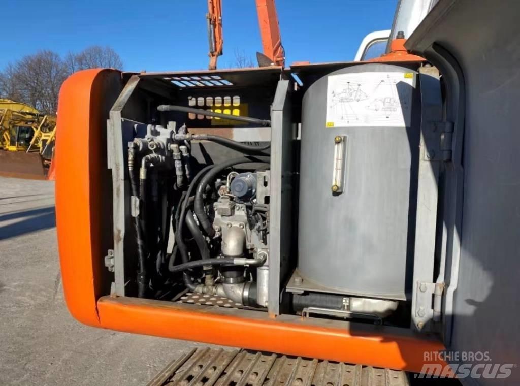 Hitachi EX 100 Гусеничні екскаватори