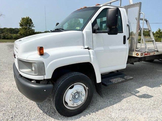 GMC 5500 Вантажівки-платформи/бокове розвантаження
