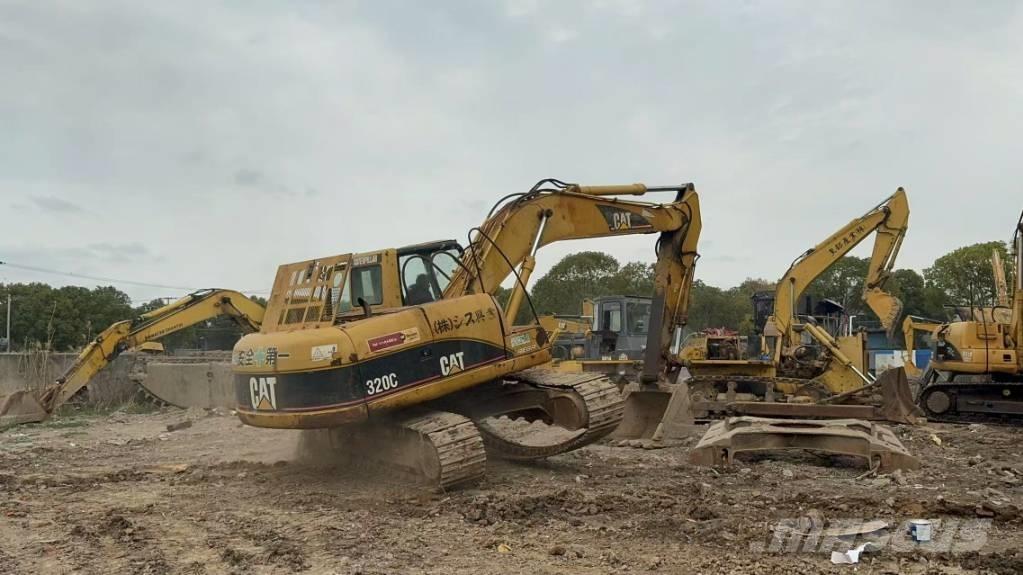 CAT 320 C Гусеничні екскаватори
