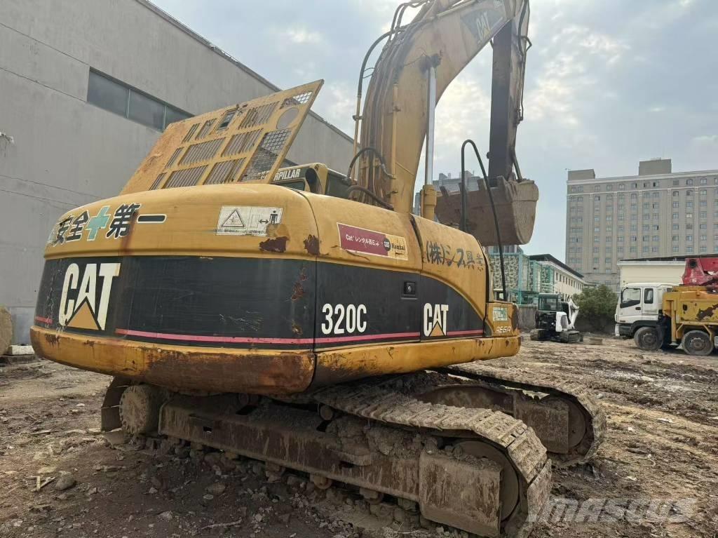 CAT 320 C Гусеничні екскаватори