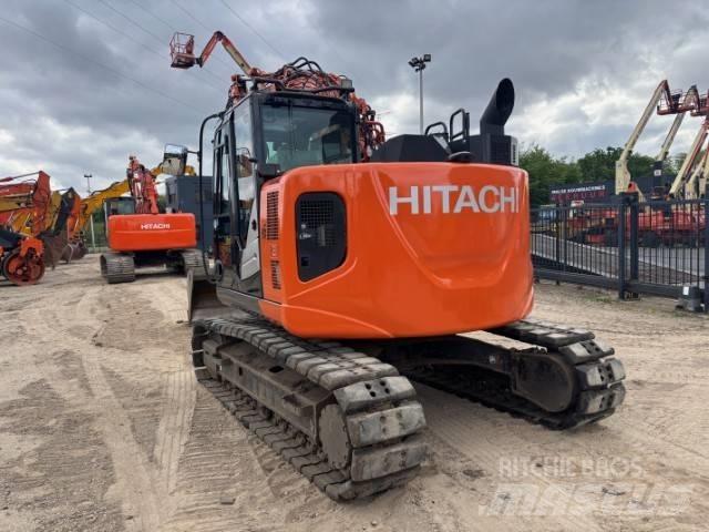 Hitachi ZX 135 US-6 Гусеничні екскаватори
