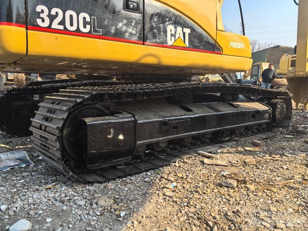 CAT 320 Гусеничні екскаватори